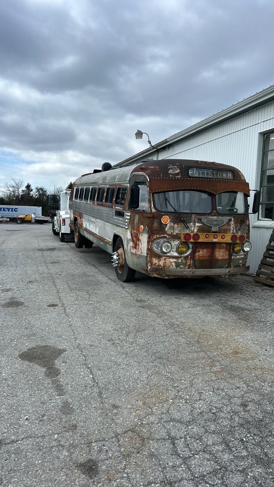 Old bus being towed in Exton PA