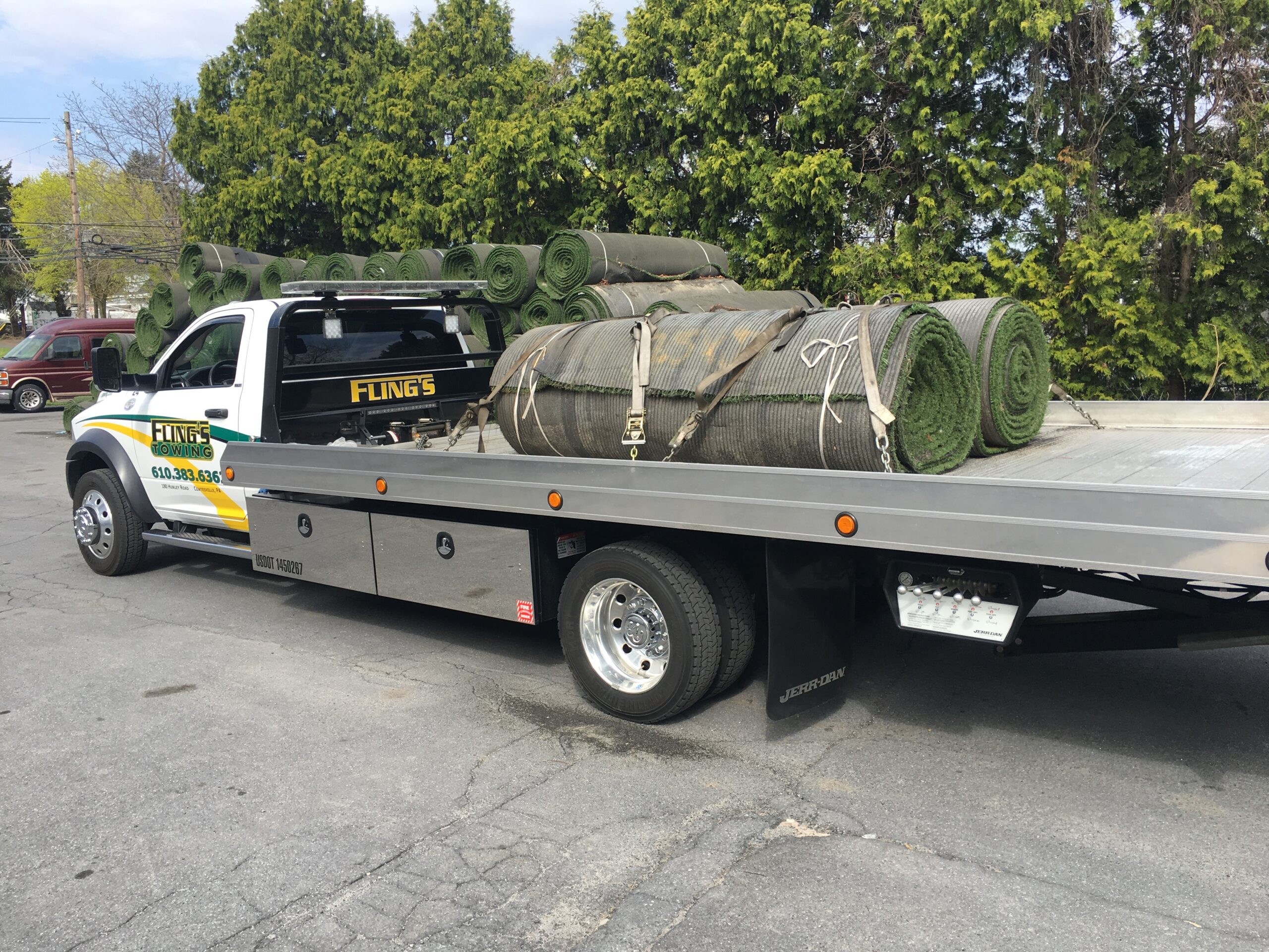 flings towing equipment hauling artifical turf
