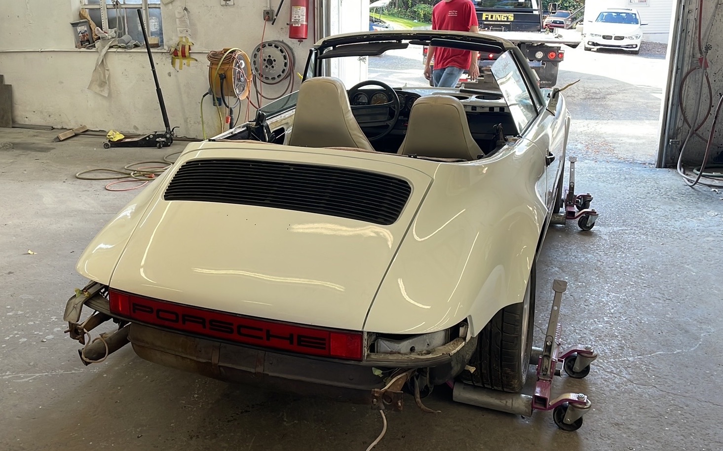 Porsche convertible being towed in Coatesville PA