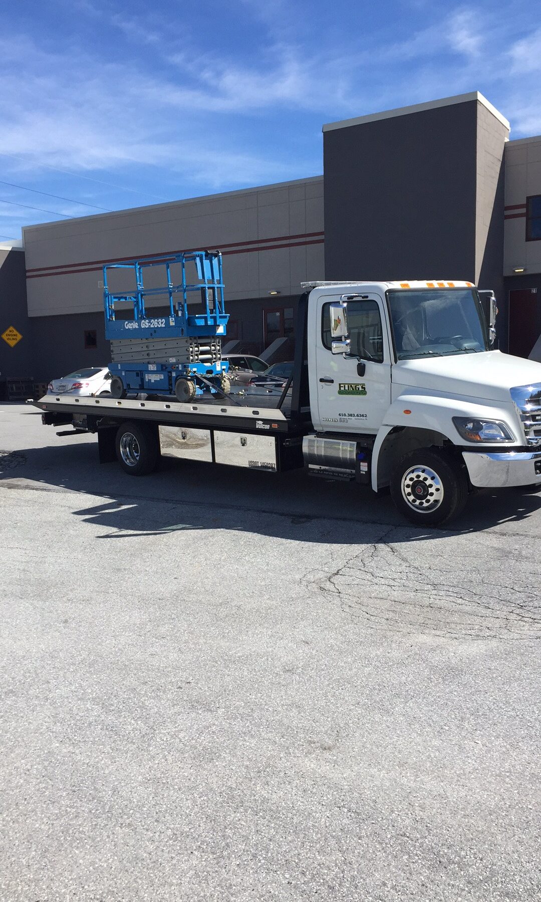 flings towing scissor lift towing transport relocation flatbed towing downingtown pa 19335