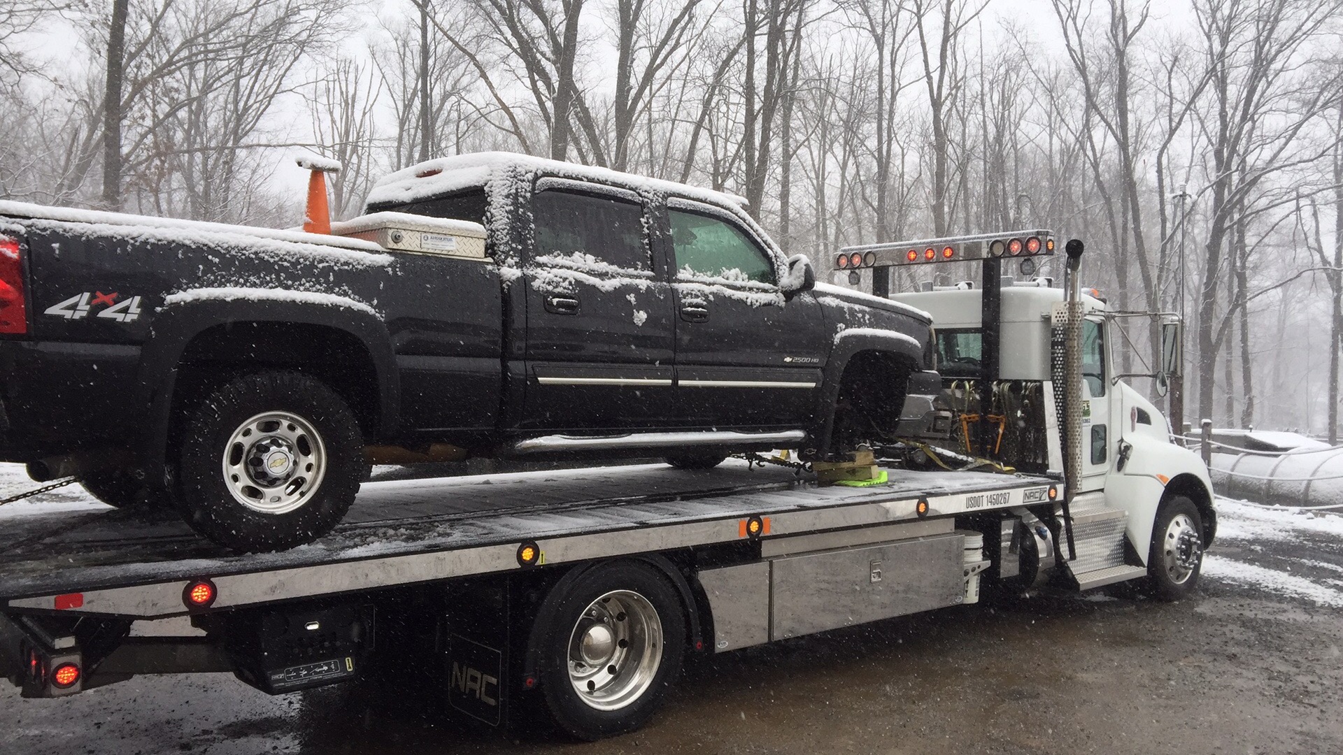 flings towing truck 29 22.5 foot long 20000 pound NRC 20TB carrier flatbed tow truck 3