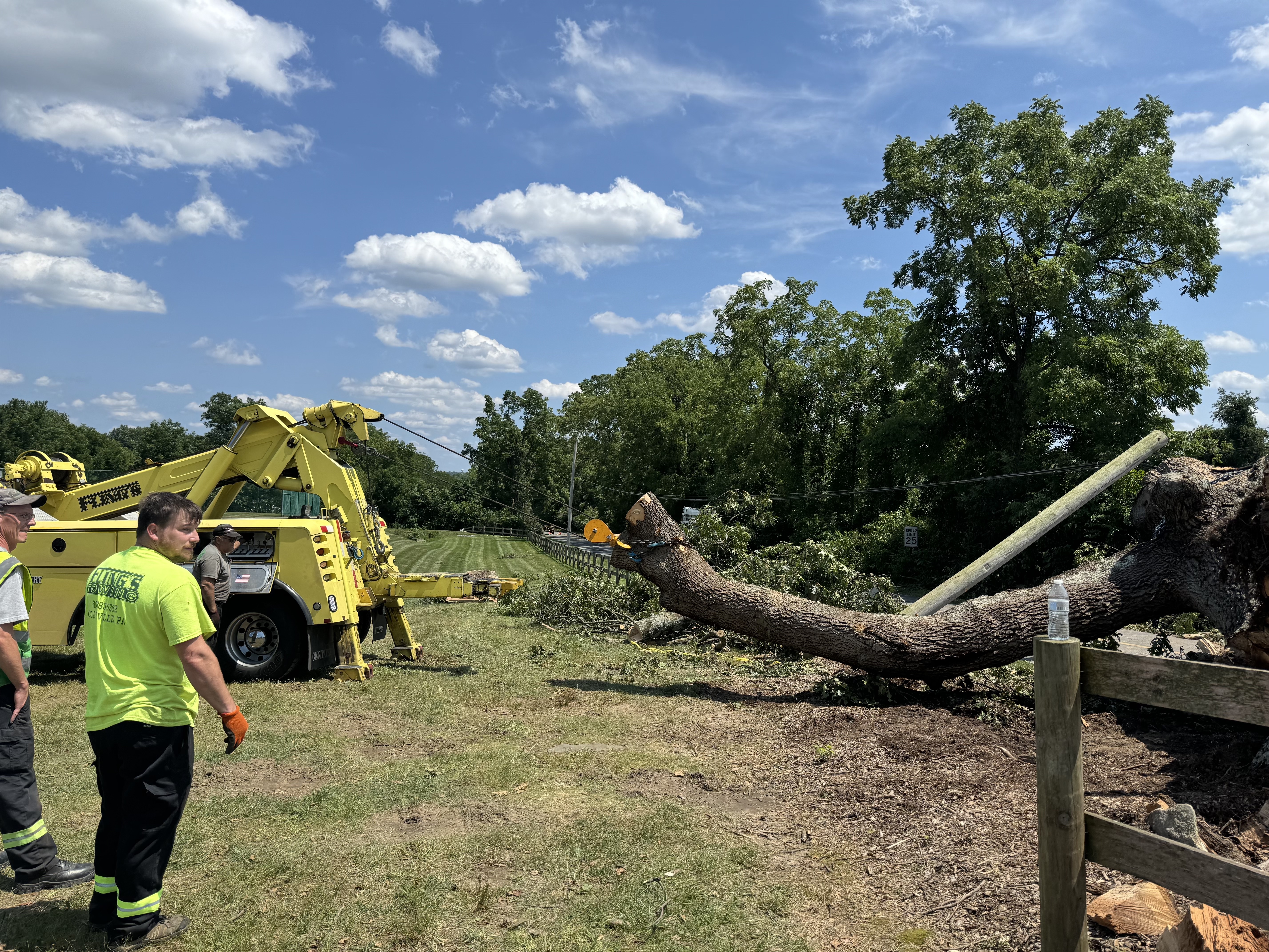 flings towing black oak tree layton park coatesville pennsylvania storm clean up_9 Fling's Towing 50-ton wrecker moving a massive 1700s era black oak tree at Layton Park in Coatesville, PA